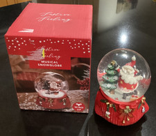 TJM Wind Up Musical Snow Globe Plays "We Wish You A Merry Christmas"