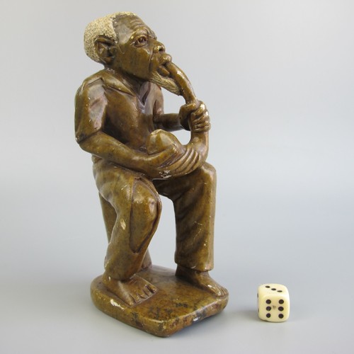 Carved stone sculpture - stone,