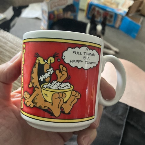 Garfield full tummy is a - is,