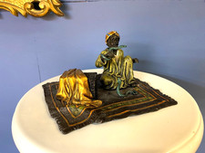 Bronze sculpture of writing