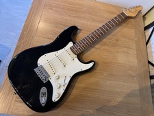Full Size Electric Guitar , strat copy , unknown make , black , in carry bag .