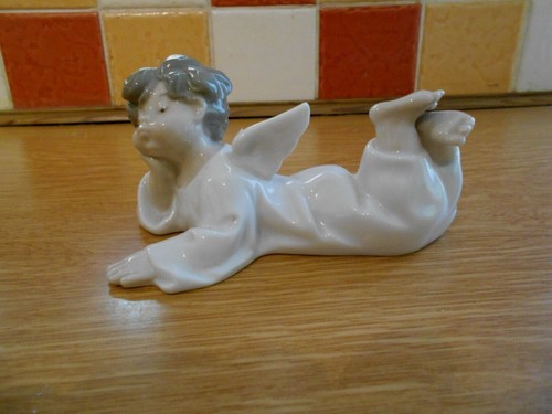 Lladro cherub angel lying down - lladro,