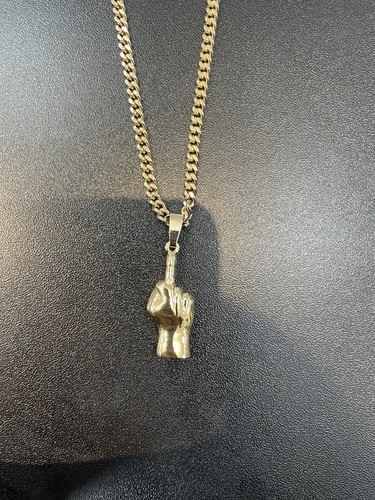 Gold tone middle finger - tone,