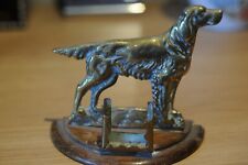 Brass model of a dog on wood plinth