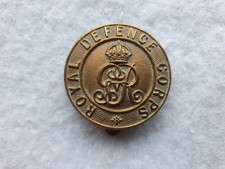 ROYAL DEFENCE CORPS BRASS CAP BADGE BY SMITH & WRIGHT