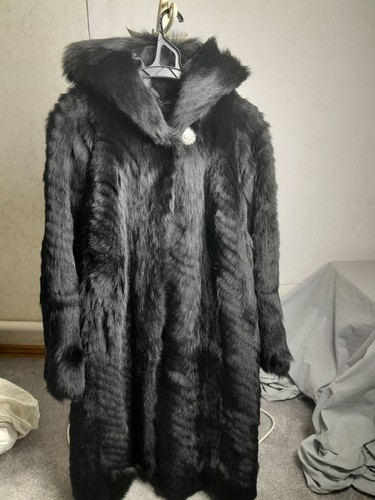 Black dyed coyote fur - dyed,