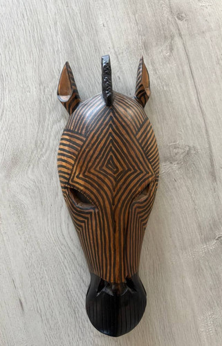 Hand carved wooden giraffe - hand,