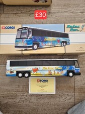 CORGI 98427 PETER PAN BIRTHDAY BUS MCI 102 DL3 DIECAST 1/50 SCALE - MINT BOXED