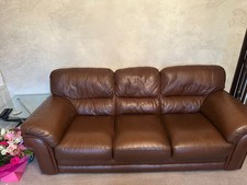 2 x 3 seater sofas and one foor stall