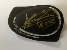 Anthony West race worn signed knee slider