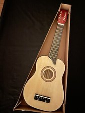 Wooden child’s toy guitar