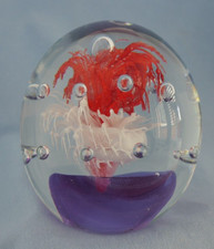 Art Glass Paperweight with Clear Bubbles, Red/White Anemone on Purple Base.