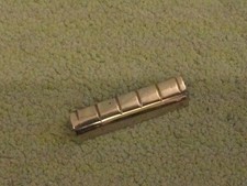 Vintage Metal Guitar Nut Riser