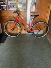Orange Raleigh Strada Hybrid