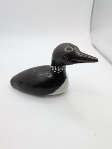 Hand crafted porcelain - hand, loon