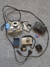 Canon digital IXUS 700 7.1MP camera w. underwater housing, charger and 2GB card.