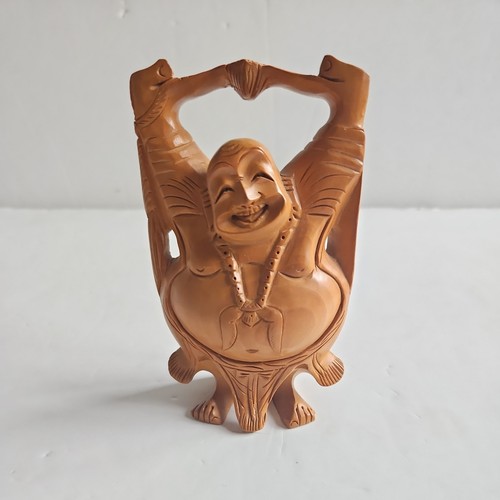 Carved wooden laughing - carved,