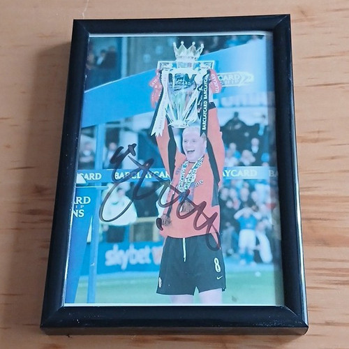 Framed signed football - signed,