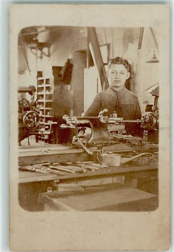 39194405 apprentice at lathe - -,