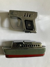 2 small vintage lighters gun