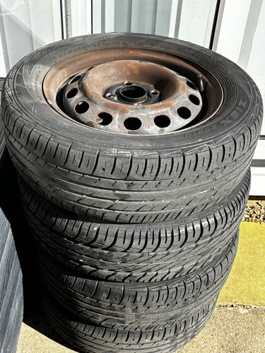 185 steel wheels with - 185/60/14,