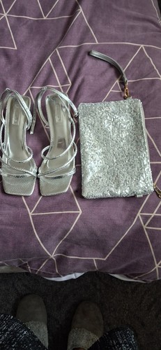 Silver sandals and hand bag - hand,