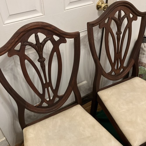 Four matching shield back