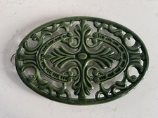 Green Oval Vintage Style Cast Iron Trivet Stand. 28cm x 19cms with hanger