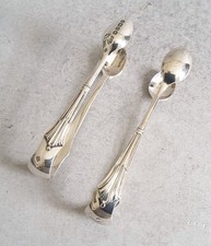 2  PAIRS ANTIQUE SOLID SILVER SUGAR TONGS  .    46gms.      SHEFF  1894  & 1902.
