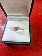 9ct gold hallmarked diamond twist ring Size N