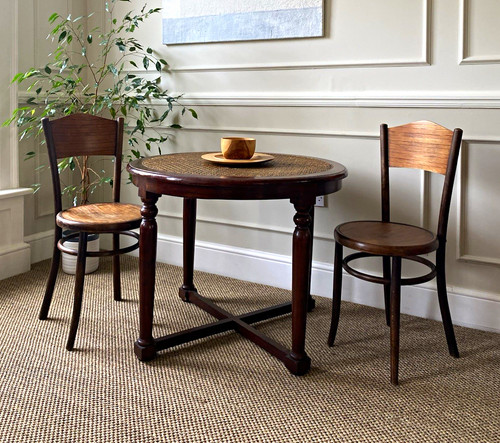 Round dark wood dining table - wood,