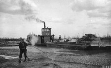 Steamer Little Delta barge on