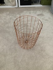 Bronze rose gold coloured metal waste bin Has been used but in a good condition.