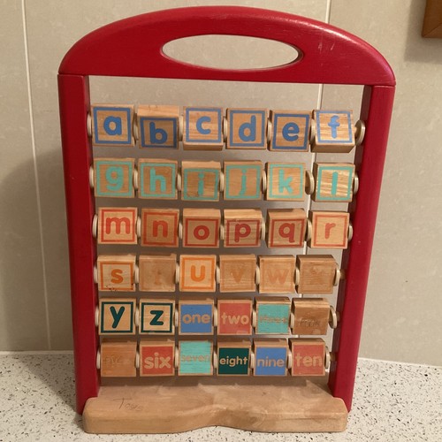 Wooden alphabet and - and, counting