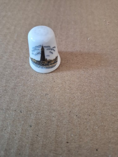 Thimble sewing needle tower