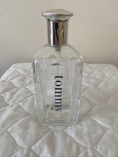 EMPTY BOTTLE OF TOMMY AFTERSHAVE BY TOMMY HILFIGER, MINT CONDITION.