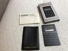 Vintage Casio SL-770 BK Solar Film Card Calculator boxed instructions & pouch