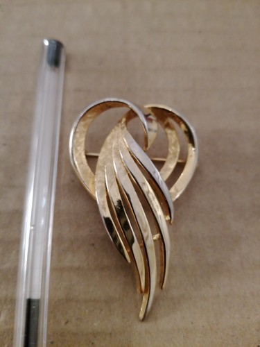Gold tone costume brooch - gold, by
