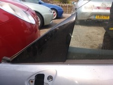 ALFA SPIDER/BRERA N/S DOOR CARBON TRIANGLE 05-11