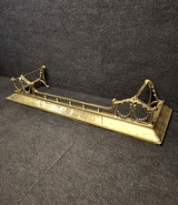 Ornamental brass fire fender /