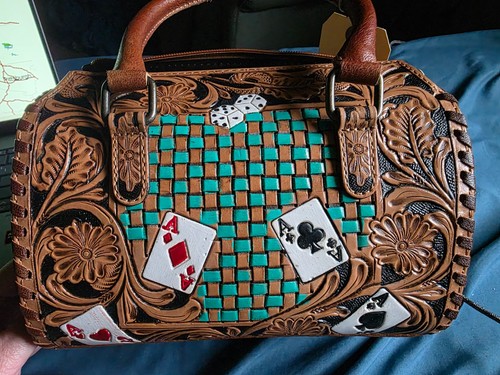 New small teal black - &,
