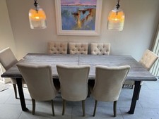 Aged white waxed wood top and aged metal legged dining table used