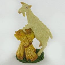 Goat On Hay Stack Sculpture