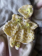Hand Knitted dolls clothes to