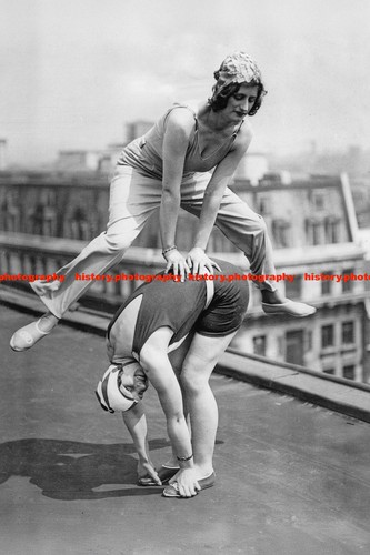 F022936 two women swimwear - in,