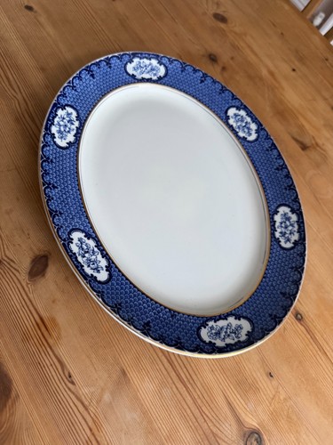Antique blue white oval - &,