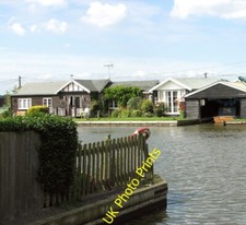Photo 6x4 Bungalows and boat