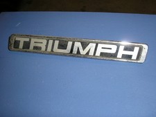 Genuine metal Triumph motor car badge. 88627252.
