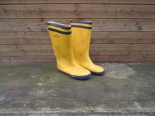 Old used Javlin sailing nautical boating yellow wellies boots for prop display
