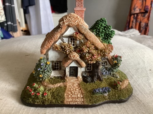 Small resin cottage ornament